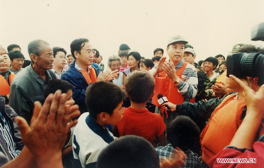 Чжан Дэцзян: 'Народ должен быть всегда в наших сердцах'