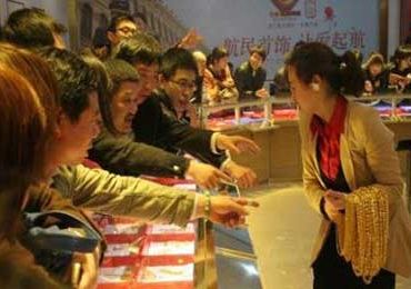 Инвестиции «китайских тетушек» прикреплены к золоту