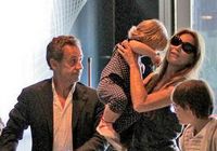 Саркози с женой и дочкой появились в аэропорту Майами