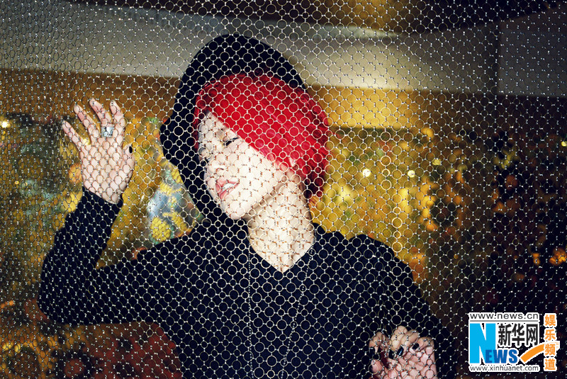 Фото: Стильная певица Тань Вэйвэй