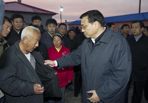 Китайский премьер призвал к комплексным реформам на селе