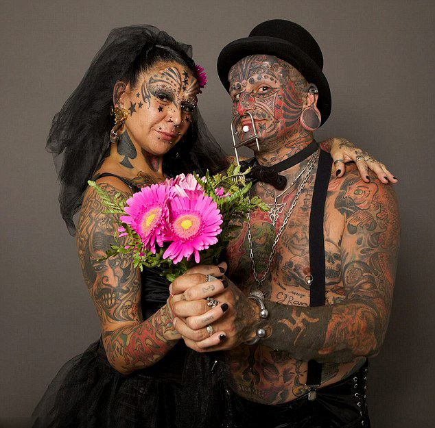 Фото: самая татуированная пара в мире