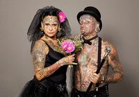 Фото: самая татуированная пара в мире