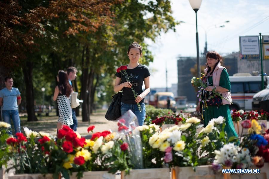 Китайские эмигранты возложили цветы в память о погибших в московском метро