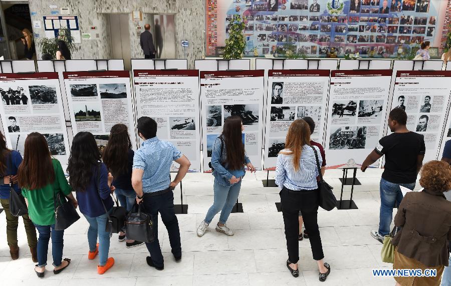 В Москве состоялась фотовыставка 'Рука об руку -- фотографии совместного сопротивления Китая и России Фашистам'