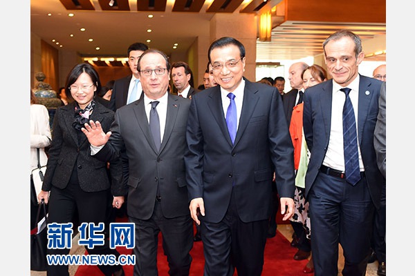 Премьер Госсовета КНР Ли Кэцян и президент Франции Ф.Олланд посетили Китайско-французский форум по климату и 'зеленой' экономике