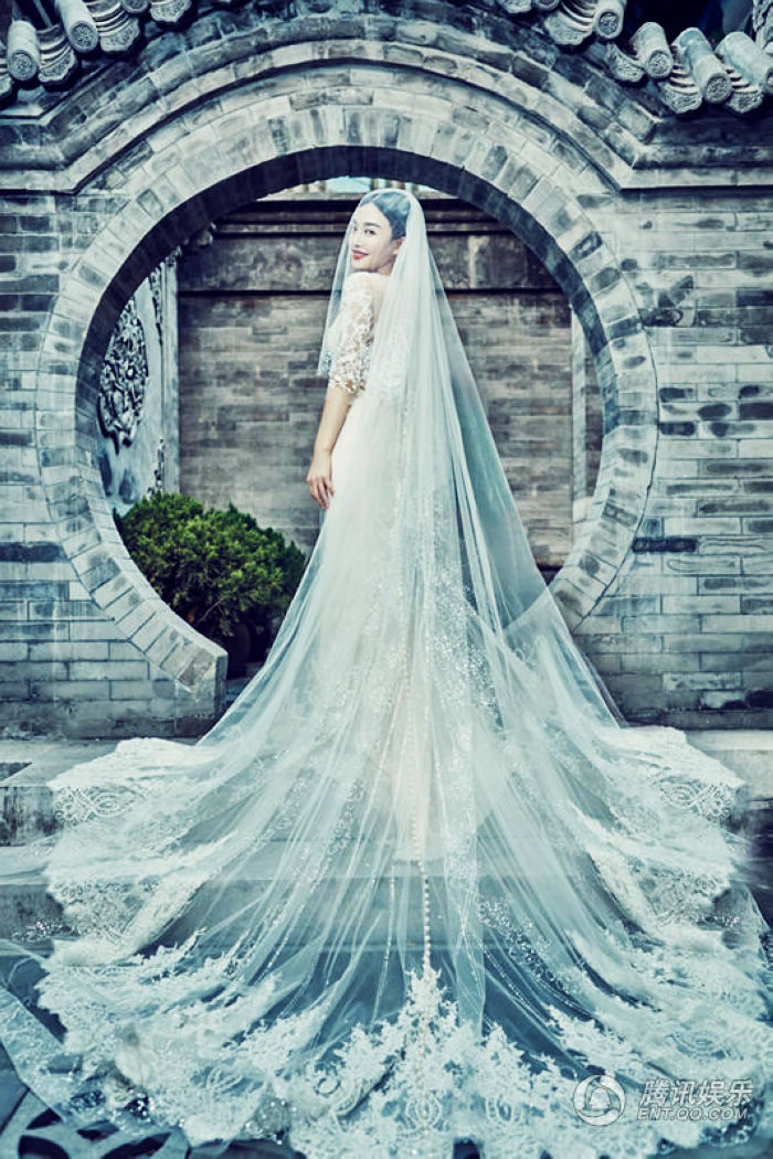 Телезвезда Цинь Лань в свадебных фото