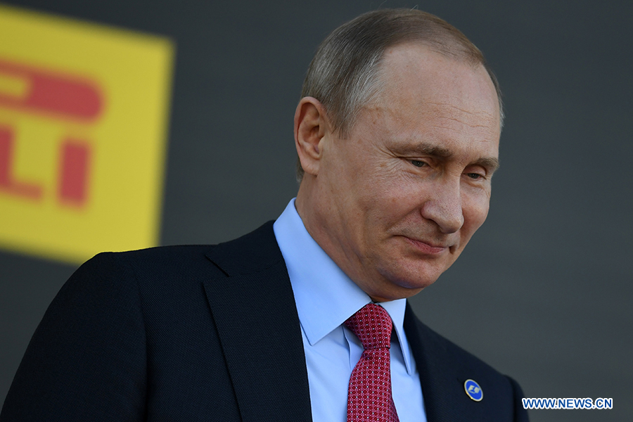 На фото -- президент России Владимир Путин, участвовавший в церемонии награждения.