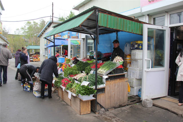 Хозяин магазина фруктов и овощей Сюй Яшань сказал, что его основной принцип - это обеспечение высокого качества.