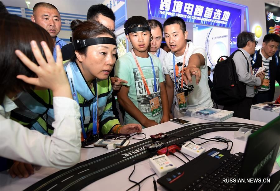 Достижения высоких технологий на торговой ярмарке в Пекине