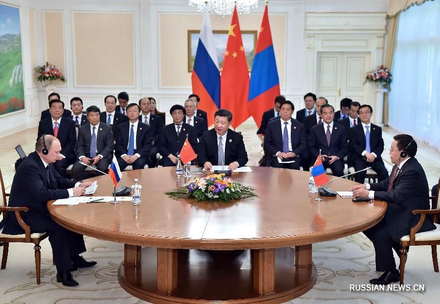Си Цзиньпин председательствовал на третьей встрече глав Китая, России и Монголии