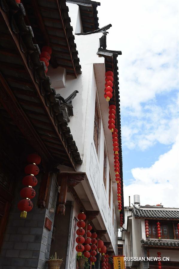 История древнего городка Гуанлу, расположенного в уезде Яоань Чусюн-Ийского автономного округа /провинция Юньнань, Юго-Западный Китай/, насчитывает более тысячи лет. 