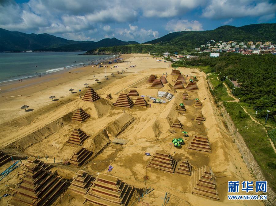 Выставка песчаной скульптуры, посвященная саммиту 'Группы 20', открылась в Чжоушане