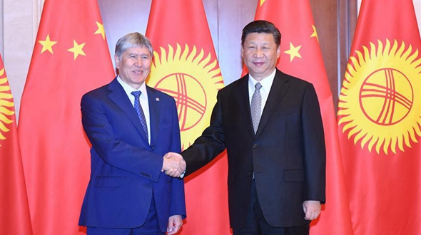 Си Цзиньпин провел встречу с президентом Кыргызстана А. Атамбаевым