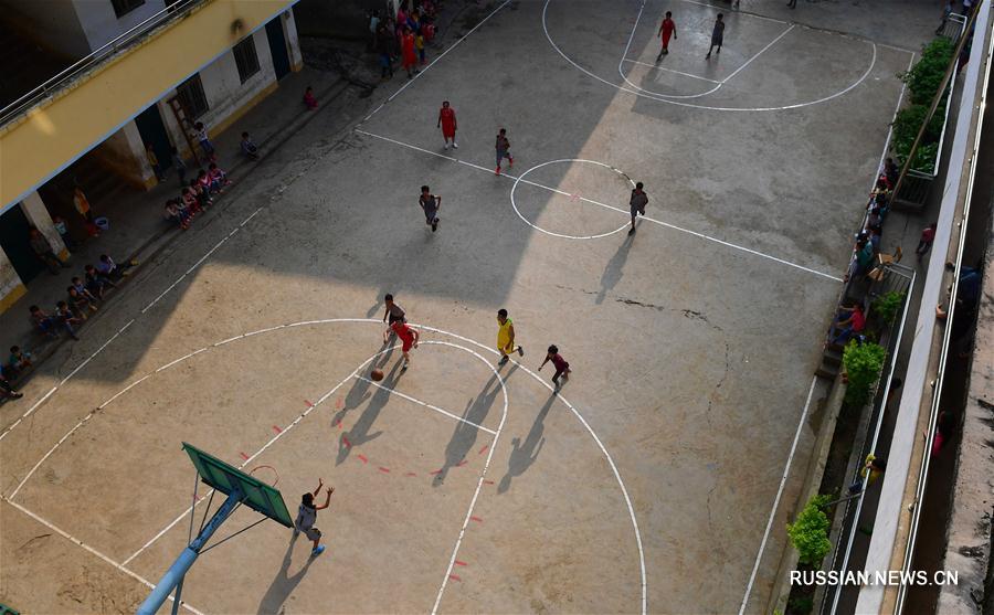 Школьный турнир по баскетболу в горной деревне уезда Дахуа