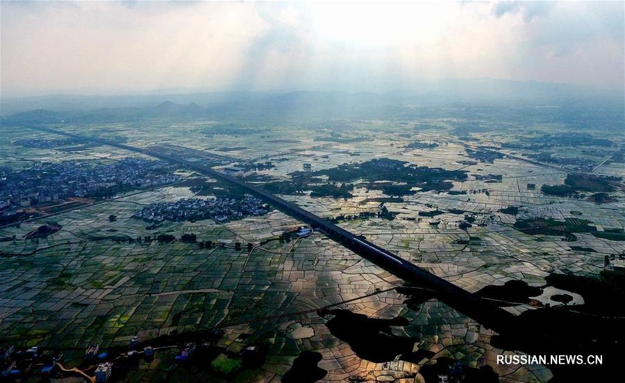 Высокоскоростные железные дороги через 'пейзажную галерею' Гуанси