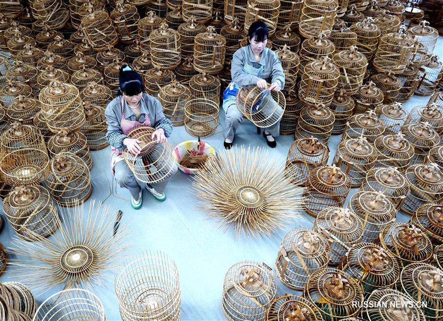 Птичьи клетки ручной работы из провинции Гуйчжоу 