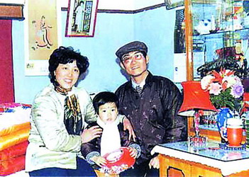 Fotos de Liuxiang y sus padres 4