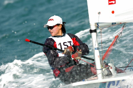 China sale la primera en número de medallas en los Juegos Asiáticos de Doha, Katar. He aquí Xu Lijia, campeona del partido abierto de vela.