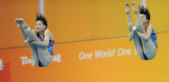 Guo Jingjing y Wu Minxia ganan medalla de oro en sincronizados 3m en JJOO de Beijing 9