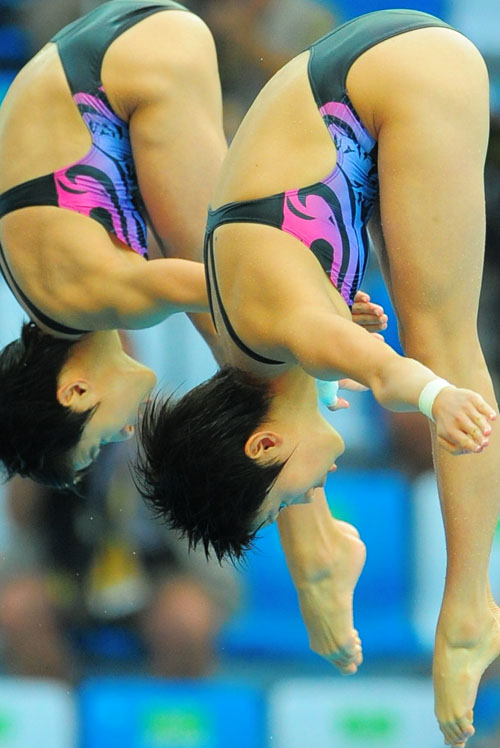 Clavadistas chinas ganan oro en salto sincronizado desde plataforma de 10 metros 1