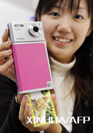 Japón desarrolla cámara fotográfica digital con impresora1