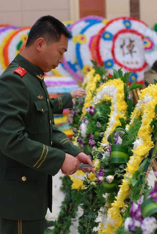 Llegarán mañana a China los cuerpos de los ocho policías chinos fallecidos en Haití 4