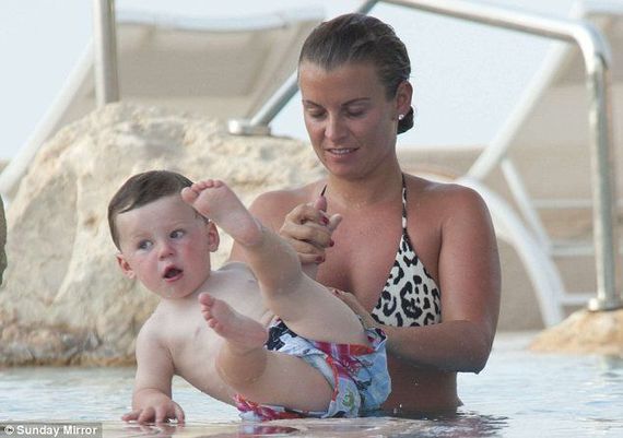 Rooney y su esposa