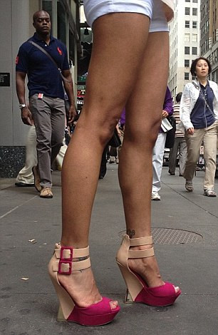 Las piernas hermosas de las mujeres en Nueva York