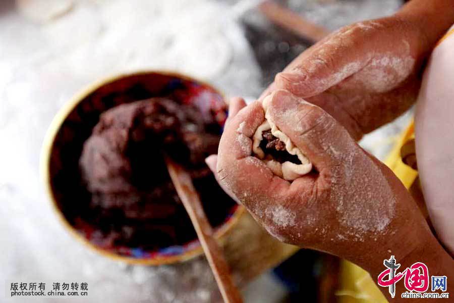 Enciclopedia de la cultura china: Platos famosos de Tianjin: “El sapo que escupe miel”3