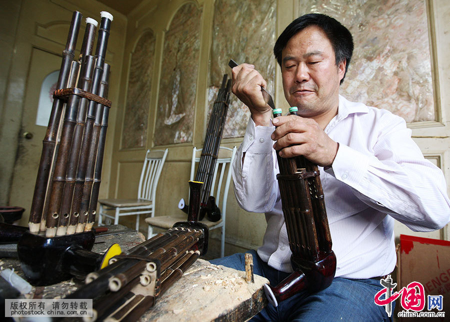 Enciclopedia de la cultura china: La producción a mano del instumento musical sheng 6