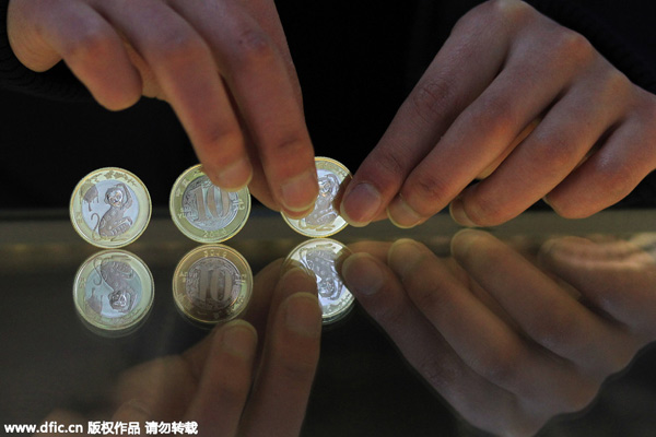 Emiten monedas para conmemorar el Año del Mono en China5