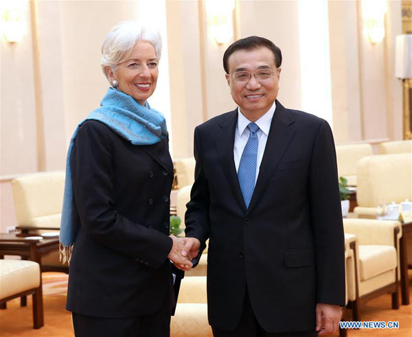 Primer ministro chino analiza con jefa de FMI asuntos financieros