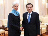 Primer ministro chino analiza con jefa de FMI asuntos financieros