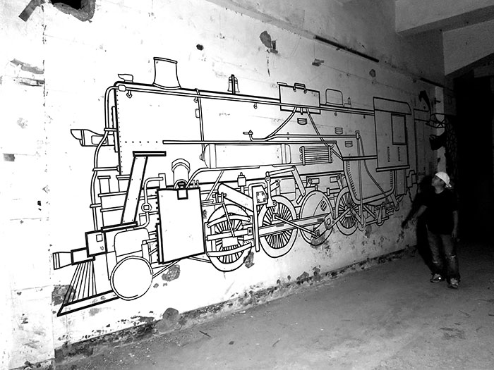 Este artista usa cinta adhesiva en vez de pintura para crear arte urbano