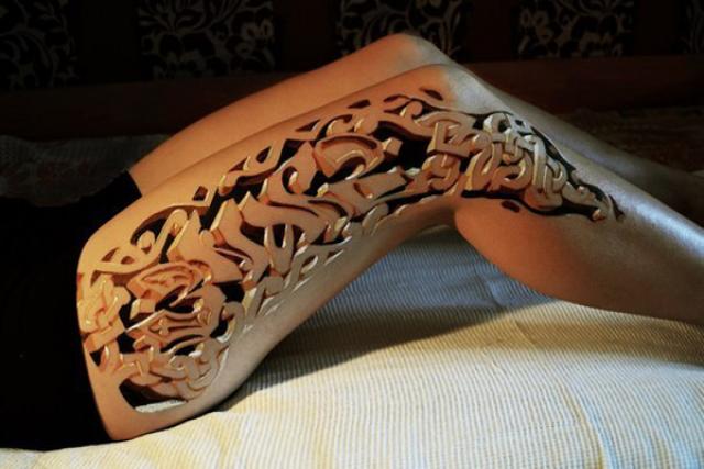 Arte sobre la piel:los efectos asombroso de los tatuajes 3D 1