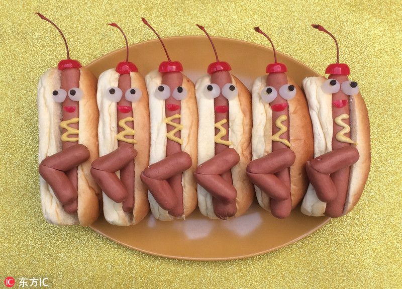 Artista &apos;pinta&apos; con hotdog