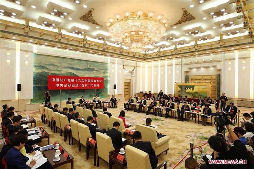 Delegados discuten el informe del XIX Congreso Nacional del PCCh
