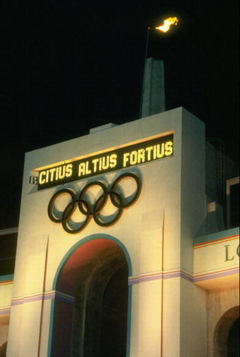 The Olympic Flame burns above the Olympic Rings in the Colliseum Stadium at the closing ceremony of the 1984 Olympic Games in Los Angeles, USA.