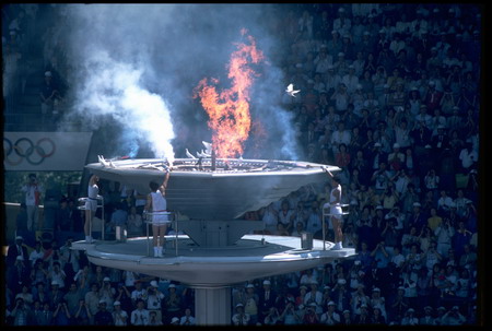 The Olympic Flame is lit by torchbearers during the opening ceremony of the 1988 Summer Olympics held in Seoul in South Korea.
