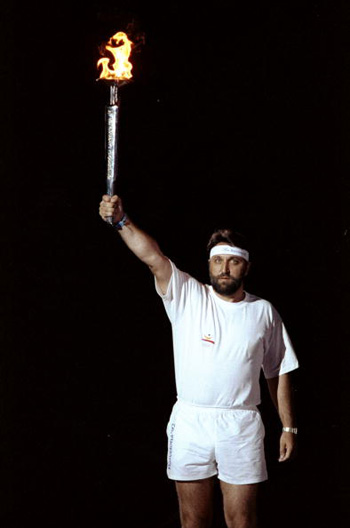 Torchbearer Hermino Menendez-Rodrigo act at the opening ceremony of the 1992 Olympic Games held in the Montjuic Stadium in Barcelona, Spain.