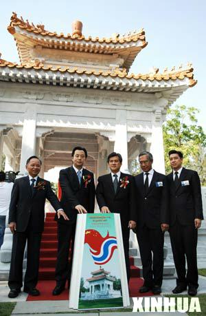 Beijing Deputy Mayor Lu Hao (2nd L), Bangkok Governor Apirak Kosayodhin (C) and Chinese Ambassador to Thailand Zhang Jiuhuan (1st L) attend the unveiling ceremony of the Sino-Thai Friendship Pavilion in Bangkok, capital of Thailand, Feb. 23, 2008. Designed and built by Beijing municipal government, the pavilion was officially presented to its friendship city Bangkok as a gift at the Lumpini Park on Saturday. 
