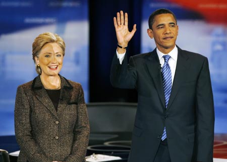 U. S. Democratic presidential candidates Senator Hillary Clinton (D-NY) and Senator Barack Obama (D-IL) pose before the last debate before the Ohio primary in Cleveland, Ohio, Feb. 26, 2008. 