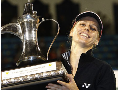 Russia's Elena Dementieva lifts her trophy after defeating compatriot Svetlana Kuznetsova at the WTA Dubai Tennis Championships March 1, 2008.