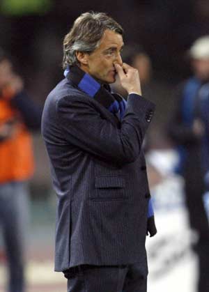 Inter Milan's coach Roberto Mancini reacts during their Italian Serie A soccer match against Napoli in Naples March 2, 2008. 