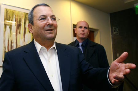 Israel's Defence Minister Ehud Barak gestures as he speaks to the media before the weekly cabinet meeting in Jerusalem Feb. 3, 2008.