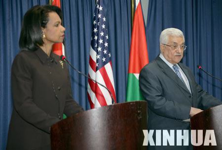 Palestinian President Mahmoud Abbas (R) and visiting U.S. Secretary of State Condoleezza Rice speak in a press conference in Ramallah, March 4, 2008. Rice urged Israel and the Palestinians on Tuesday to resume suspended peace negotiations and said she believed a deal was still possible by the end of the year.