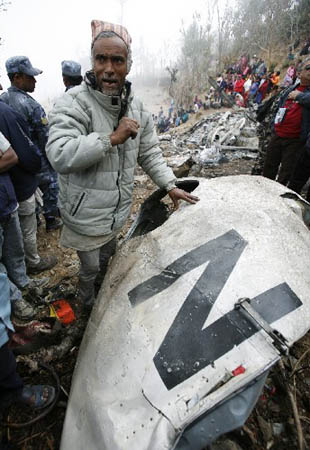 Durga Bahadur Bhandari, an eyewitness of the crash, describes the event that took place at the crash site in Ramechhap, near Kathmandu, March 4, 2008. Ten people were killed when a helicopter carrying United Nations officials crashed in bad weather over hilly terrain near Nepal's capital on Monday, police and airport officials said.