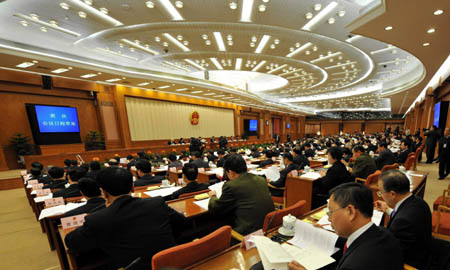 The presidium of the First Session of the 11th National People's Congress (NPC) gather for their first meeting at the Great Hall of the People in Beijing, capital of China, March 4, 2008. (Xinhua/Fan Rujun)