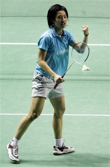 Yip Pui Yin of Hong Kong, reacts after beating number one seed Xie Xingfang, in the women's singles first-round match, at the All England Badminton Championships in the National Indoor Arena, Birmingham, England, Wednesday, March 5, 2008.